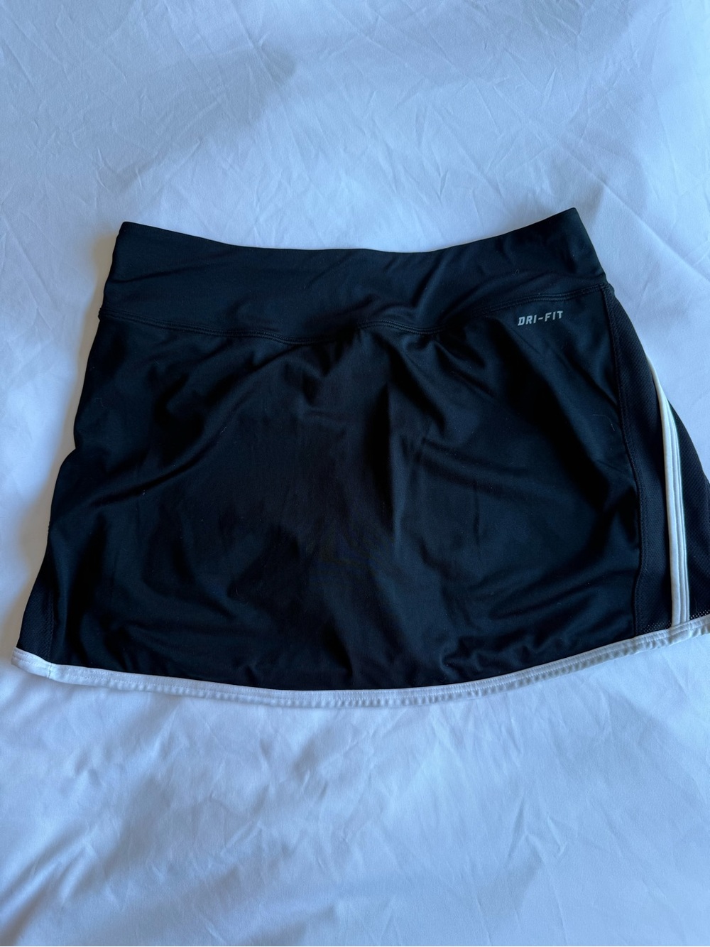 Nike Women’s Black Skort with White Trim and Swoosh - Picture 2 of 4